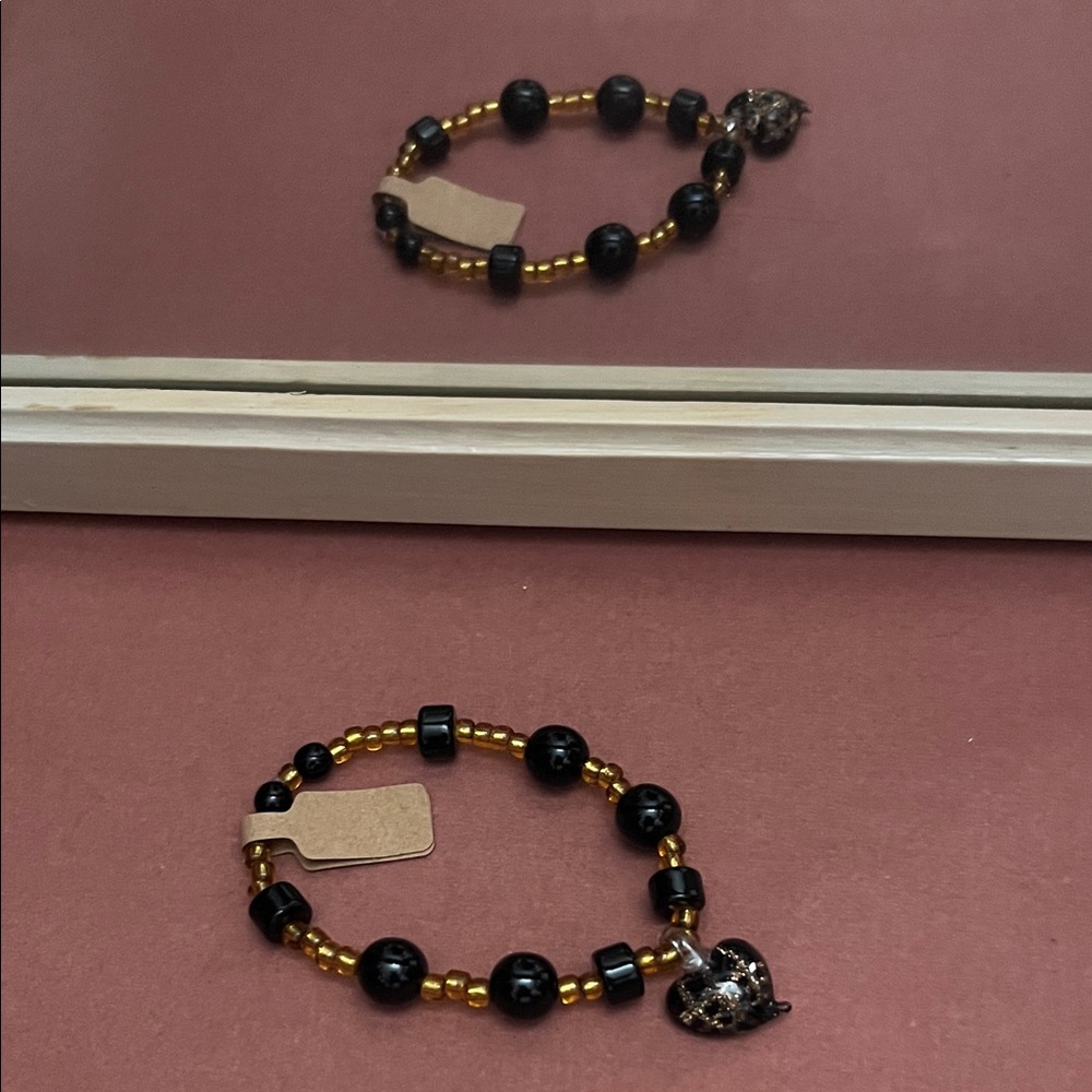 Glossy bubble black and gold heart bracelet!